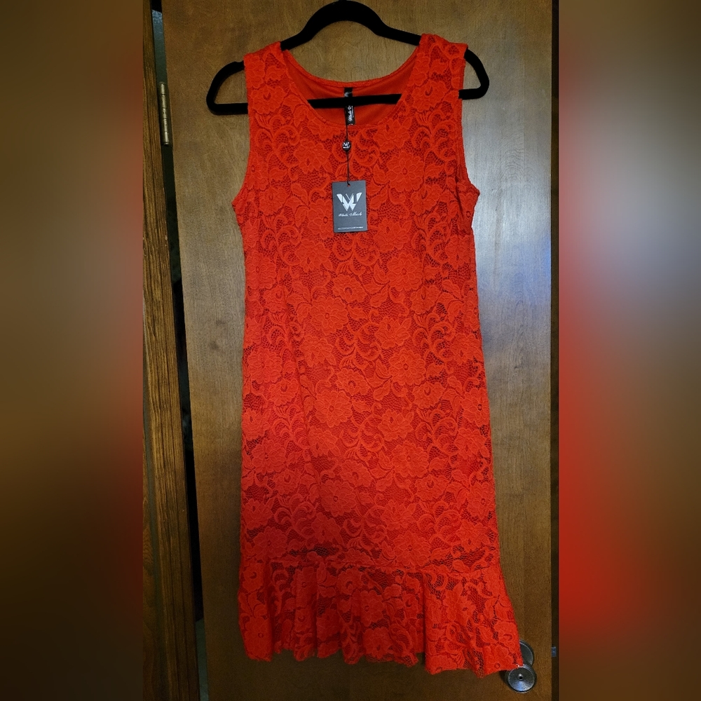 Beautiful red lace dress fits more like a medium brand new with tags